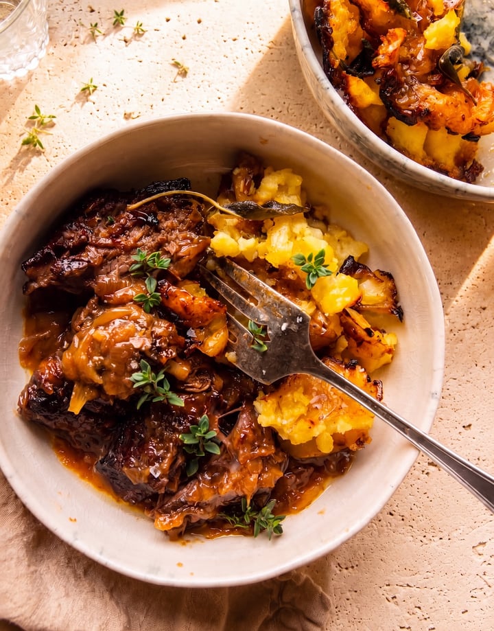 Braised pot roast served with mashed potatoes