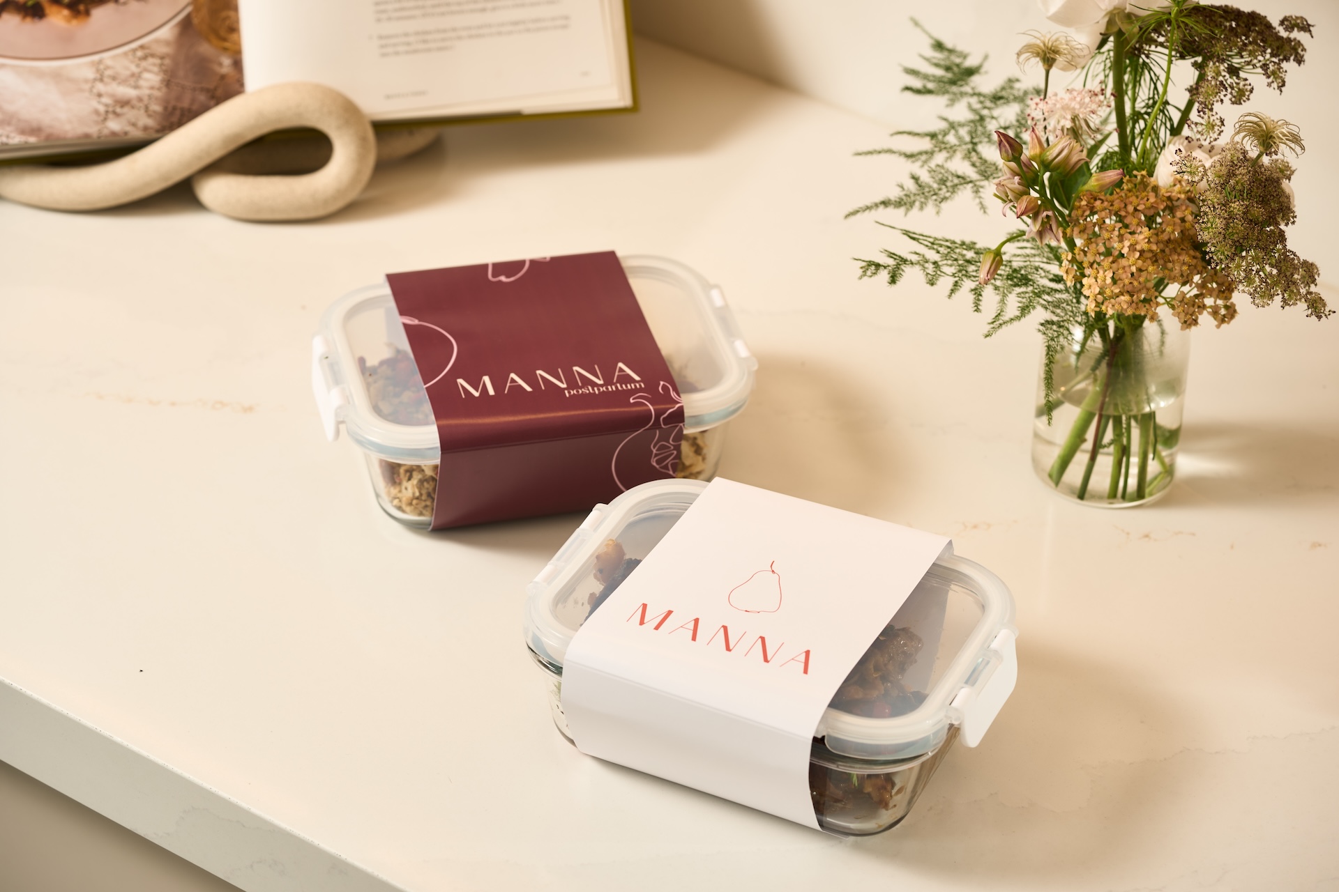 Manna meals packed in reusable glass containers